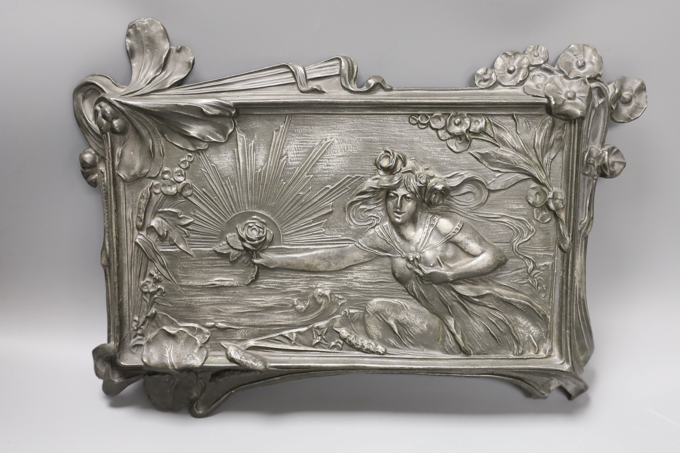 Two WMF plaques and another Art Nouveau plaque stamped gesetzlich geschützt H M R